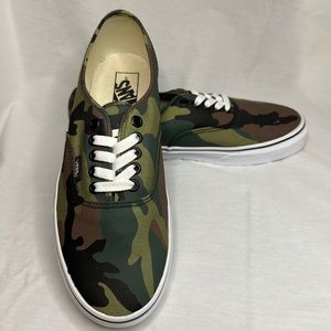 Vans camouflage low top canvas laced sneakers. Women’s size 10, men’s size 8.5.